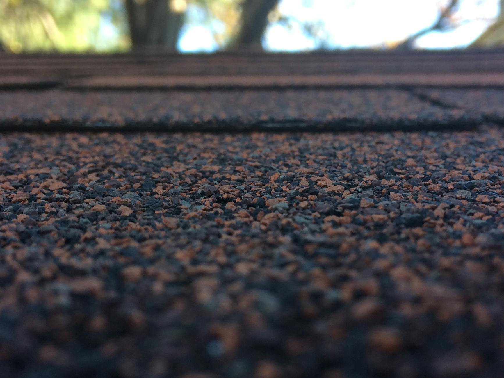 Close-up of Class 4 impact-resistant shingles installed on an Oklahoma City home